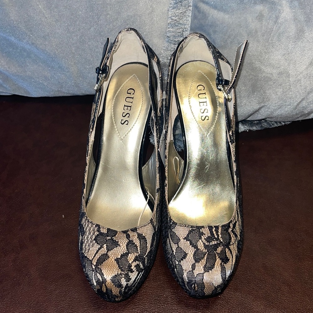 Guess pump floral heels. Size 9. Color: Black. Brand New Never Worn! No Box